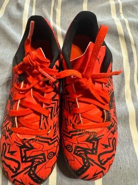 Puma Black and Red Soccer Cleats